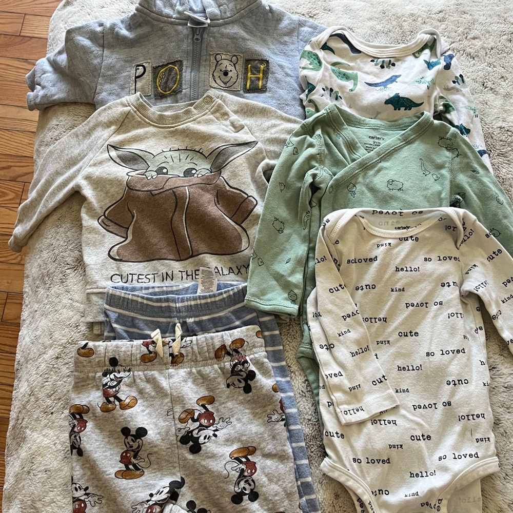 6-9 Month clothes. 3 long sleeve, 2 pants, 2 sweater.